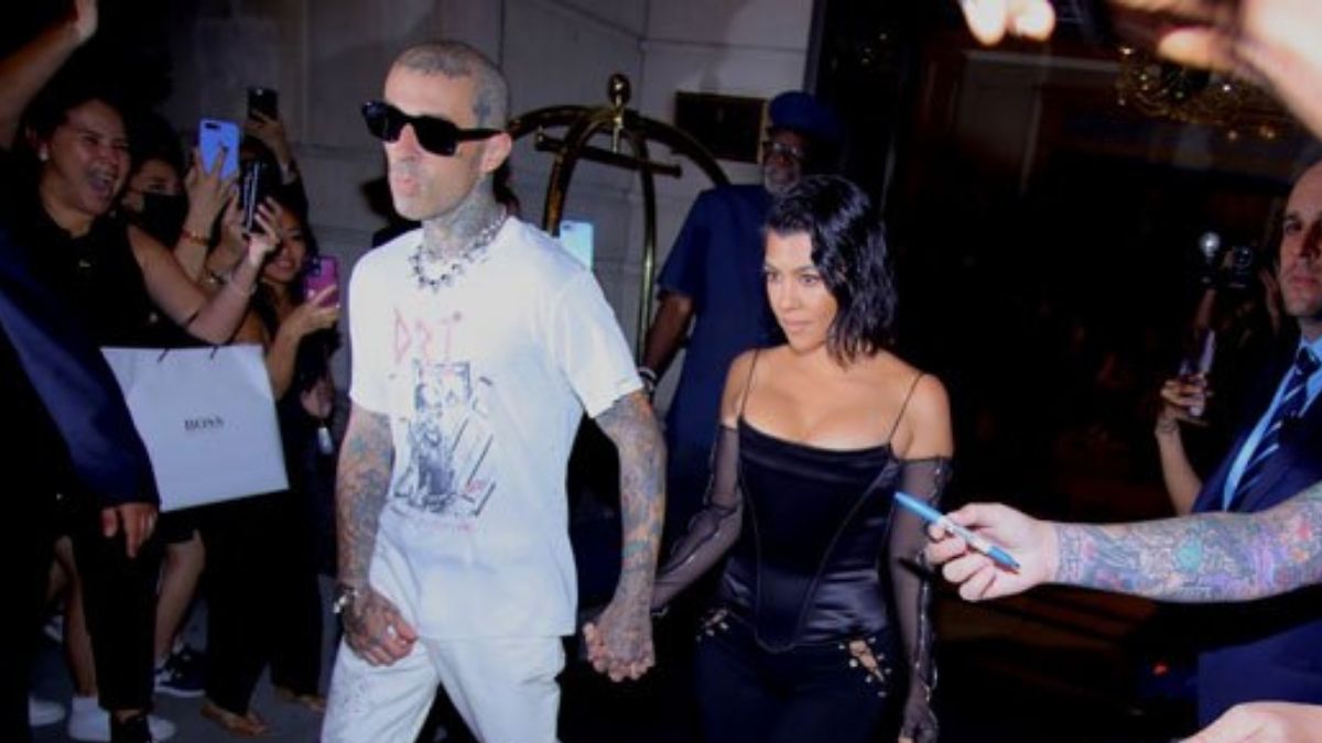 Kourtney Kardashian Wears Low Cut Velvet Top As She Holds HandsWith Travis Barker For NYC Date Night